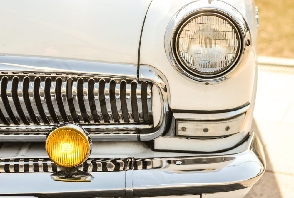 white retro car, with chrome bumper
