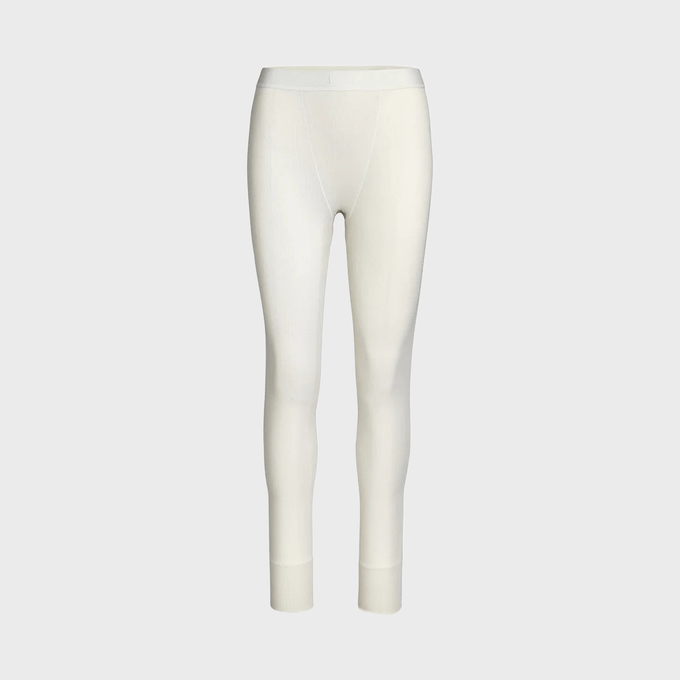 White thermal leggings displayed frontally against a plain, light gray background.