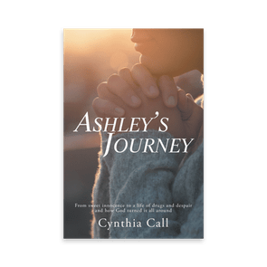 Hands clasped in prayer, illuminated by warm sunlight. Text: â€œAshleyâ€™s Journeyâ€ by Cynthia Call, about overcoming despair with faith.
