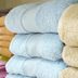 Here's Why Bathroom Towels Have Those Woven Strips on Both Ends