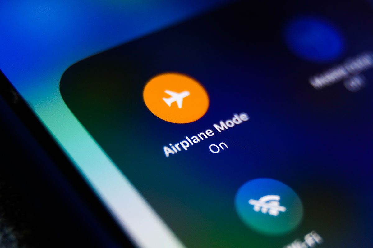 Airplane Mode icon is seen displayed on a phone screen 
