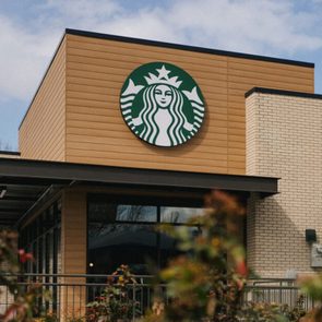 Starbucks storefront with logo at the centre