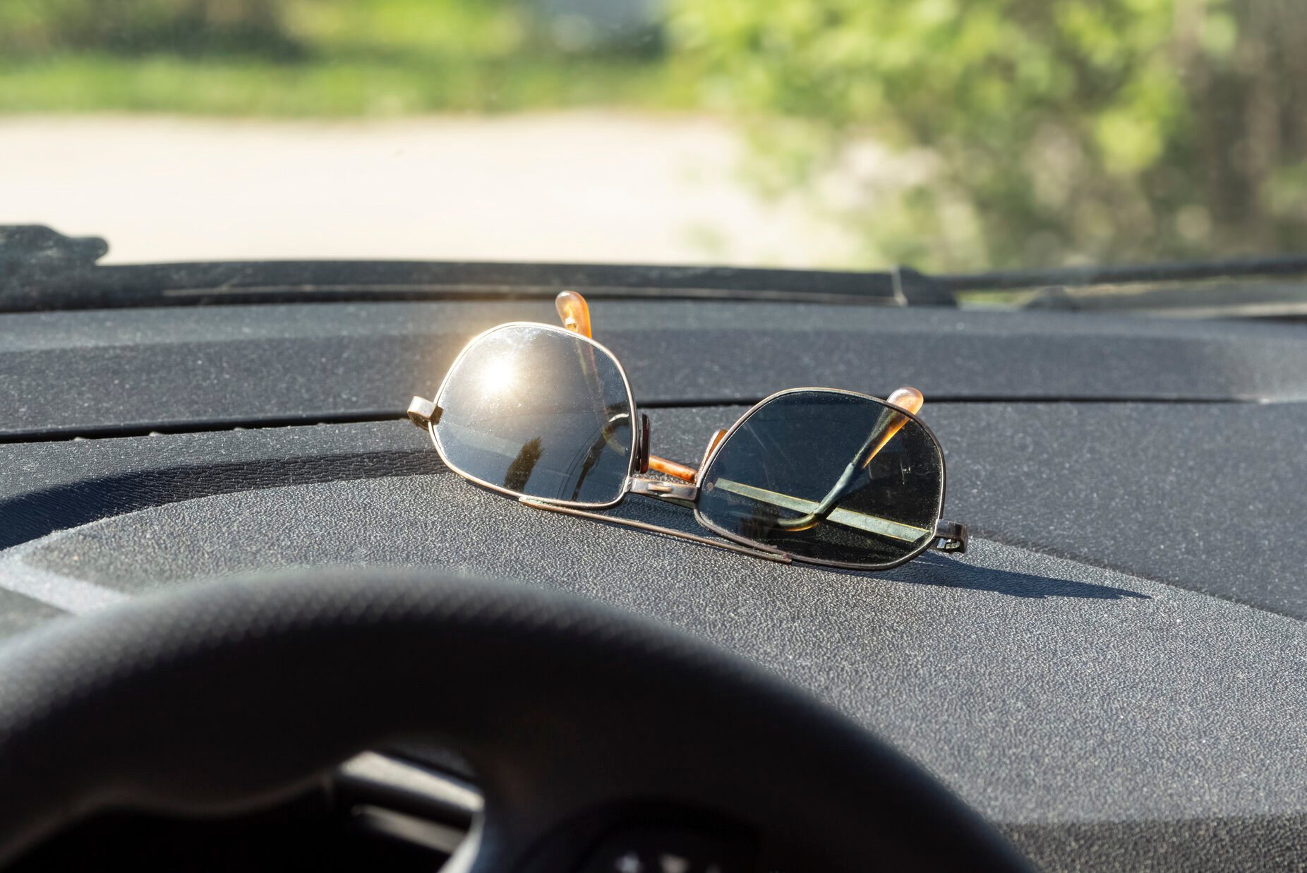 Sunglasses on the dashboard
