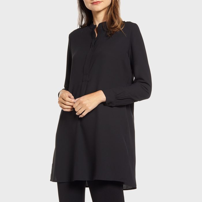 Women wearing a long black tunic shirt