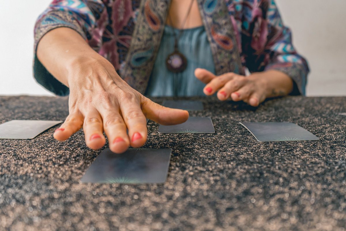 Tarot reader preparing to reveal the cards